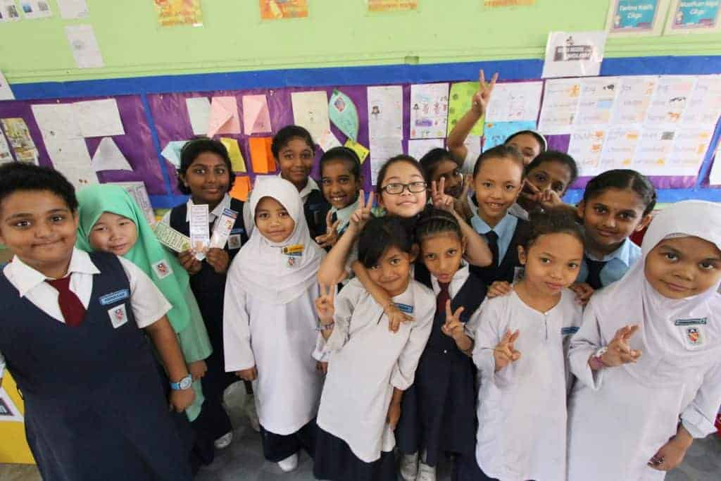 Malaysian school children in group pose